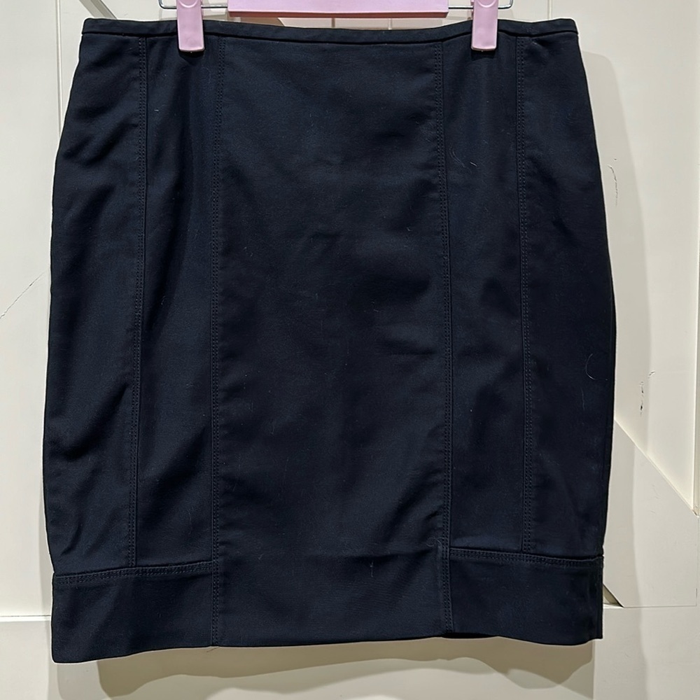 WHBM black zippered skirt. Size 12. Has lines going down for a flattering look.